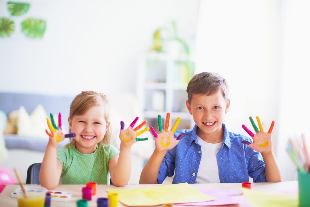 kids showing hands with color indoor activities for kids