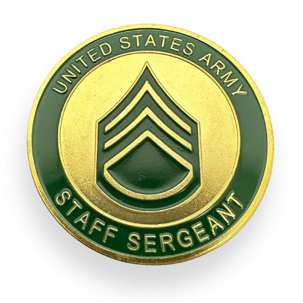 Staff Sergeant Military Challenge Coins located over white background